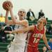 Dexter's Emma Kill looks for an open team mate as she is guarded by Canton's Rachel Winters during the second half the regional semifinal game at Novi High School Tuesday, Mar. 5th.
Courtney Sacco I AnnArbor.com  